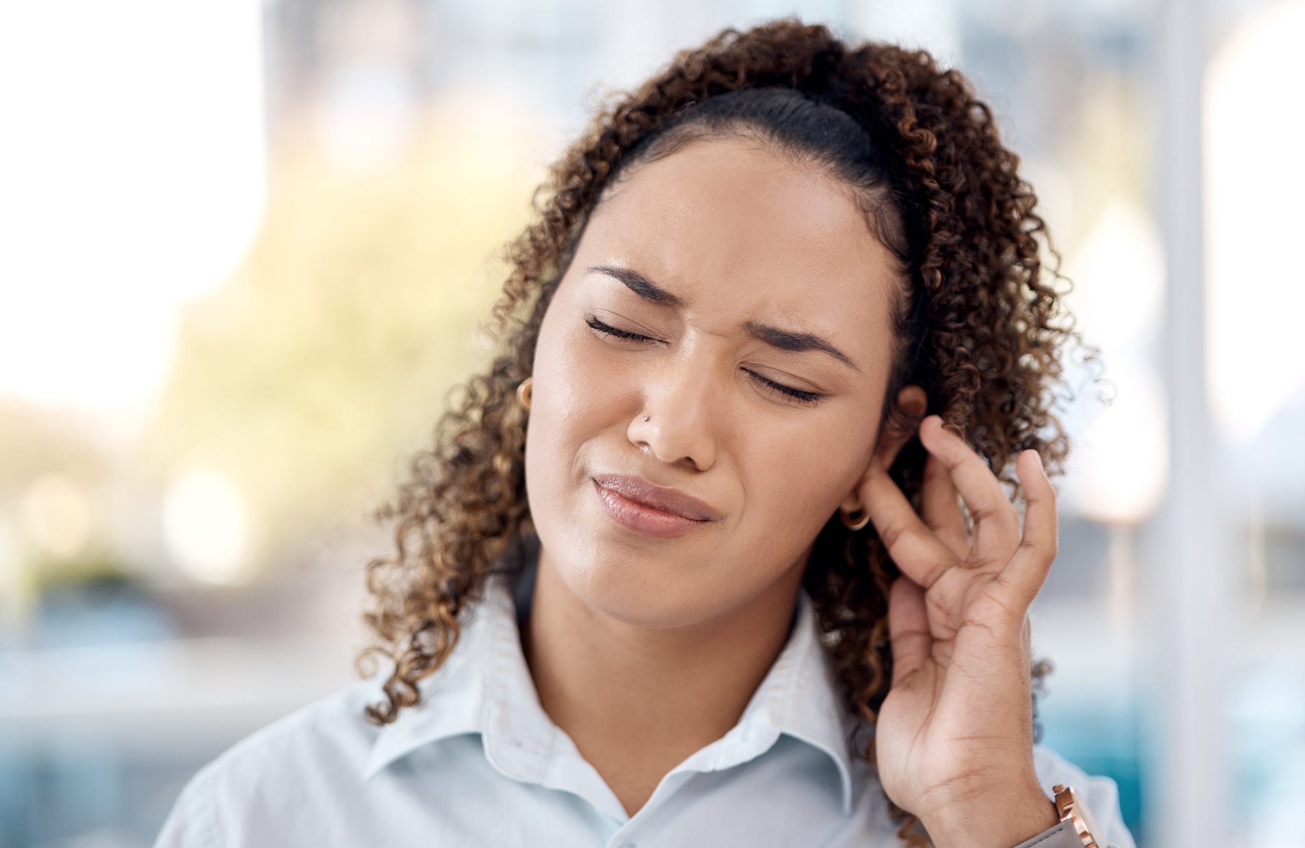 woman with a painful earache